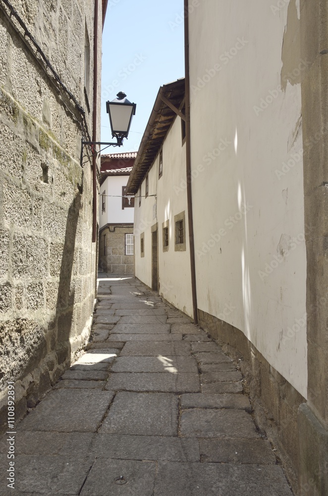 Stone alley in  Guimaraes, Portugal