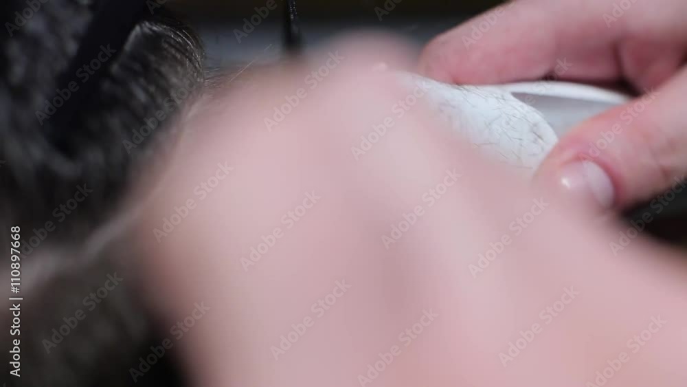 Brunette men's hair cut close up. Brunette men's hair cut close up.