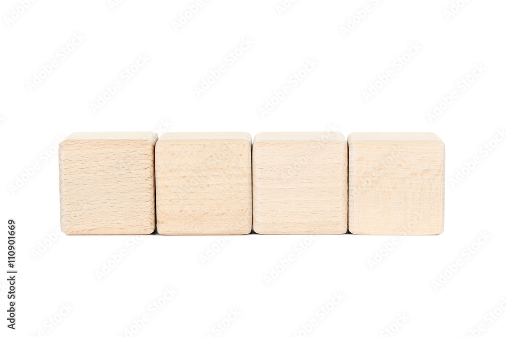 Wooden toy cubes isolated on a white Wooden toy cubes isolated on a white