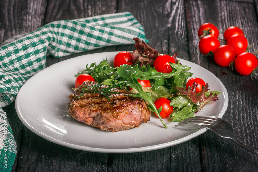 steak and salad on a plate steak and salad on a plate