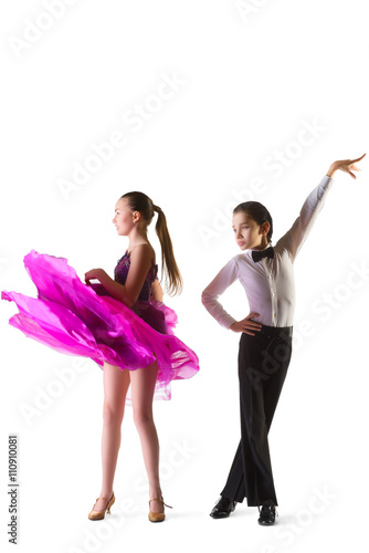 Boy and girl or beautiful couple in the active ballroom dance on white background