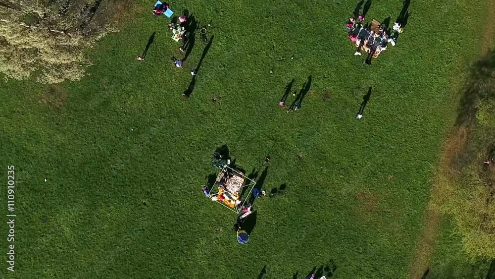 Top view of people resting in the spring park and making barbecue at May weekend, St. Petersburg, Russia
Top view of people resting in the spring park and making barbecue at May weekend, St. Petersburg, Russia