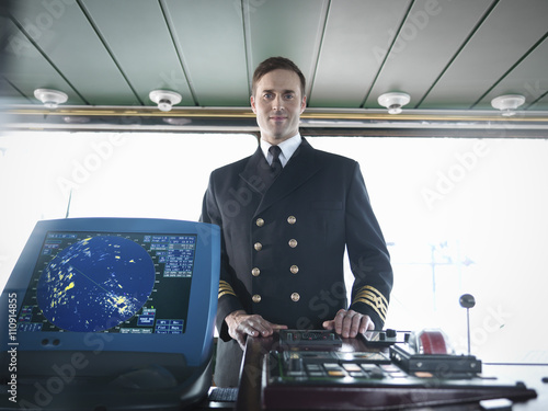 Portrait of captain on bridge of ship
