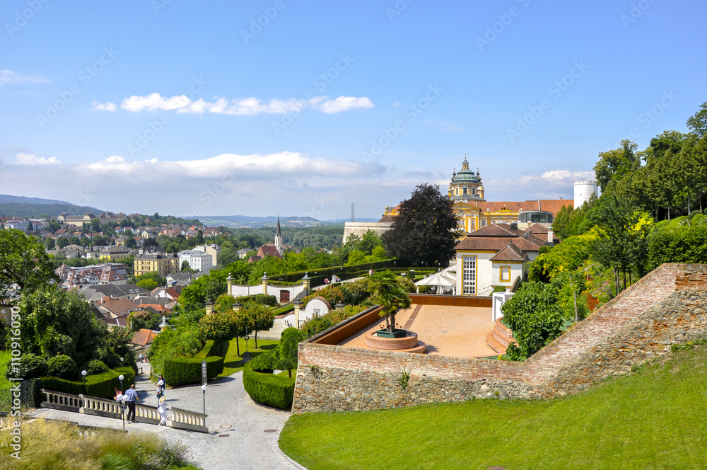 View over the main entrance to the Melk Abbey (german Stift Melk) with cityscape of Melk in the background. Melk is a town in Lower Austria, next to the Wachau valley along the Danube.