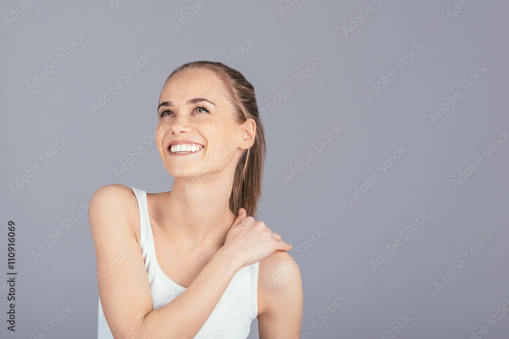 Portrait of a beautiful girl on a gray background Portrait of a beautiful girl on a gray background