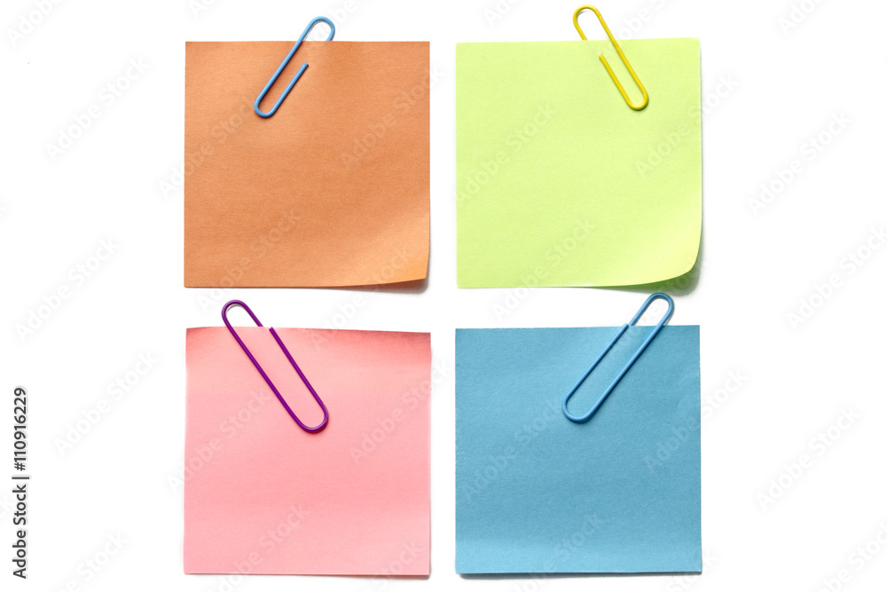 four colorful paper with paper clips four colorful paper with paper clips