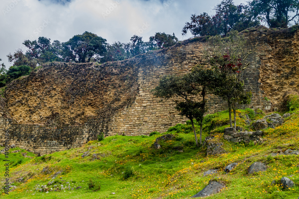 Stone wall of Kuelap, ruined citadel city of Chachapoyas cloud forest culture in mountains of northern Peru.