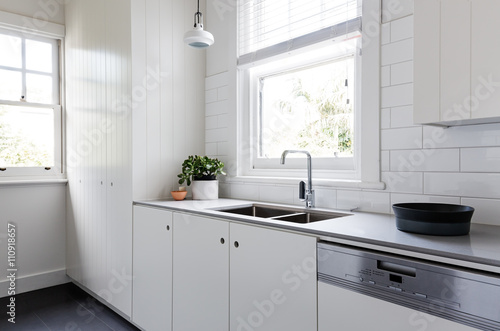 White and charcoal new renovated galley style kitchen photo