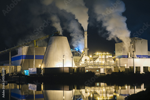 View of pulp mill and smokestacks on waterfront at night, Strait of Juan de Fuca, Port Angeles, Washington State, USA