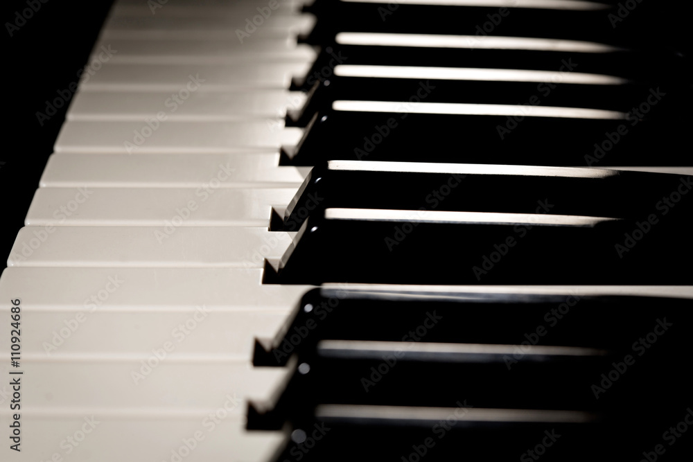 Beautiful new baby grand piano keyboard, ready to be played. Beautiful new baby grand piano keyboard, ready to be played.