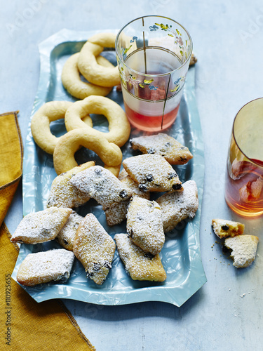 Still life with plate of Italian zaletti and bussolai photo