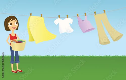 Woman outside with a clothesline