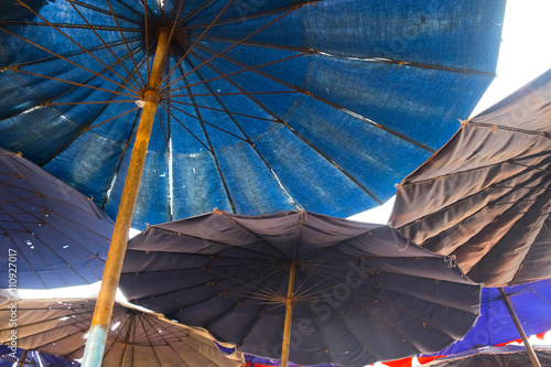 Under umbrella on the beach