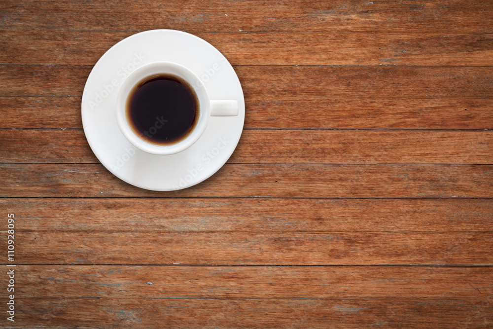 Close up white coffee cup on wooden table Close up white coffee cup on wooden table