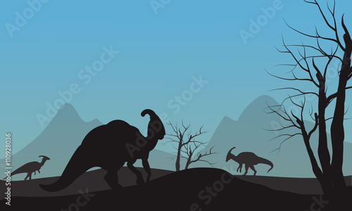 Silhouette of parasaurolophus in hills