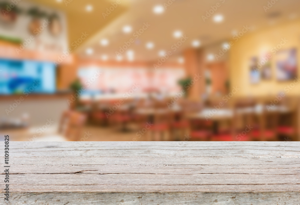 wooden table with blur restaurant, vintage style photo