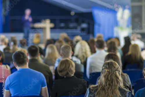Business Conference Concept and Ideas. Lecturer Speaking In front of the Audience © danmorgan12