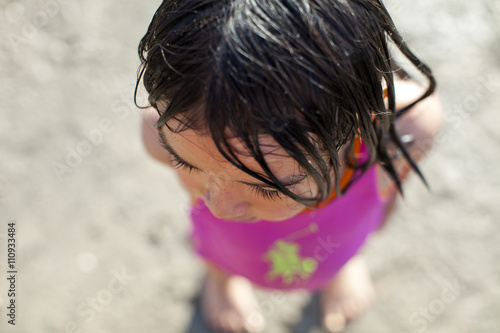 Girl playing on beach
