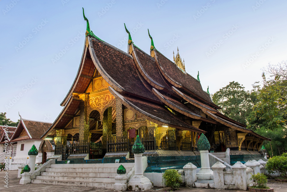 Wat Xieng thong temple at twilight time in Luang Pra bang, Laos