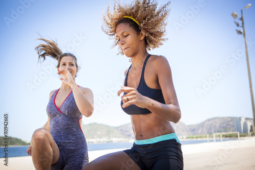 Young women exercising photo