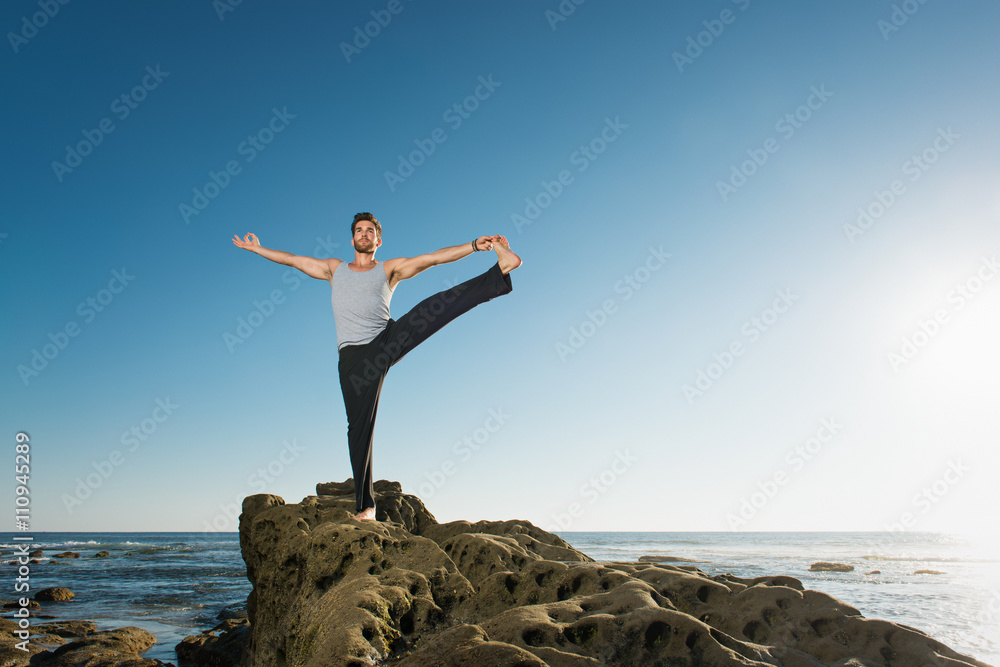Standing Big Toe pose - Utthita Hasta Padangusthasana, Windansea beach, La Jolla, California Standing Big Toe pose - Utthita Hasta Padangusthasana, Windansea beach, La Jolla, California