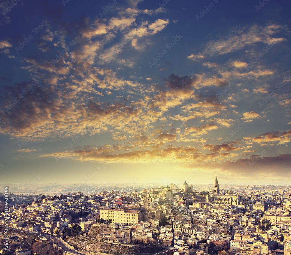 A magnificent sunset. panoramic view of medieval city of Toledo. Vintage style travel background