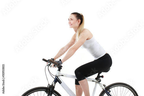 Fototapeta Naklejka Na Ścianę i Meble -  Young sexy woman on a bicykle