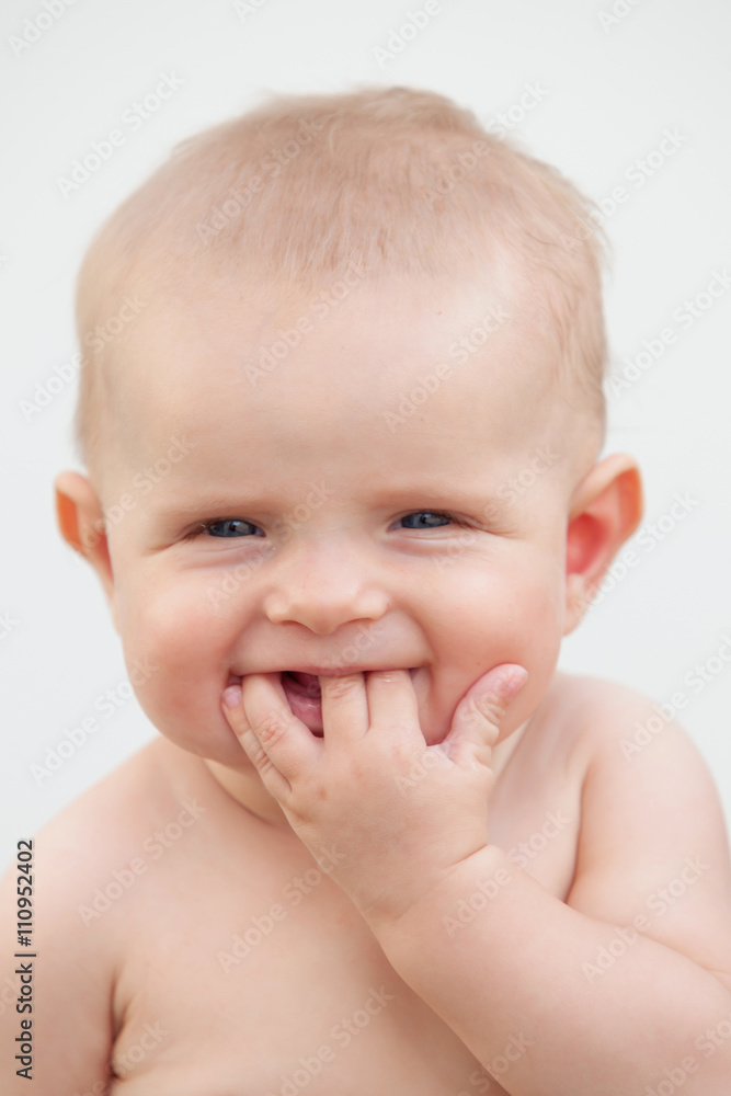 Little baby six month with blue eyes and blond hair Little baby six month with blue eyes and blond hair