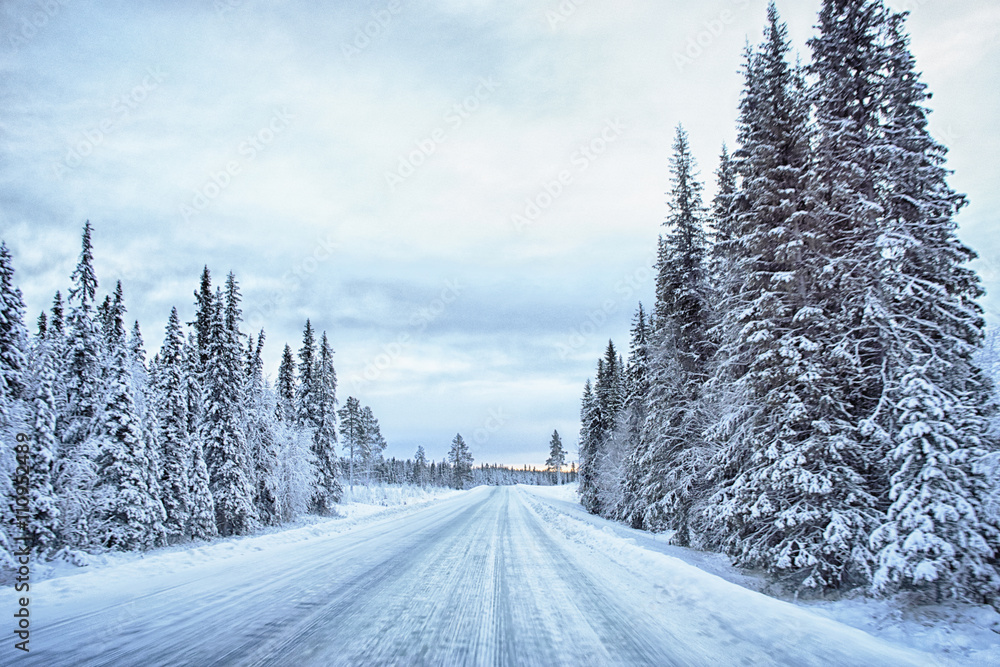 View of empty snow covered highway, Hemavan, Sweden View of empty snow covered highway, Hemavan, Sweden