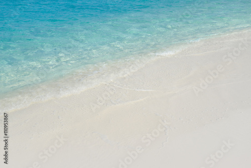 White sand beach and turquoise sea water, Maldives