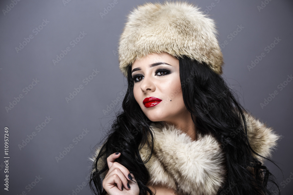 Fur Fashion. Beautiful Girl in Fur Hat. Winter Woman Portrait Fur Fashion. Beautiful Girl in Fur Hat. Winter Woman Portrait