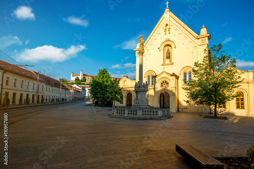 Photography Capuchin church with castle hill on the background in Bratislava city in Slovaki