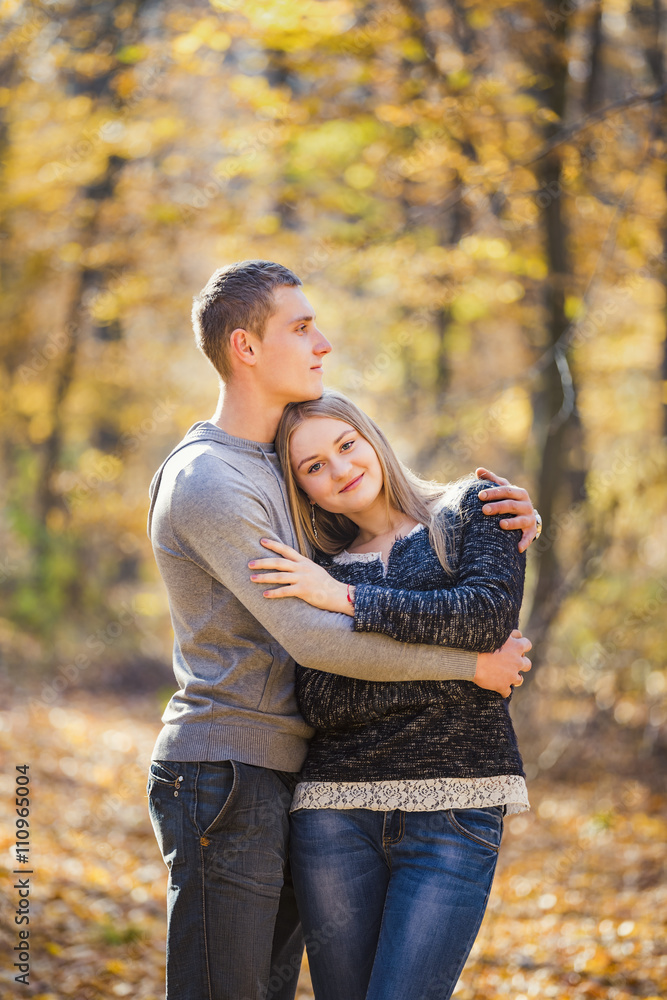 couple in the autumn forest couple in the autumn forest