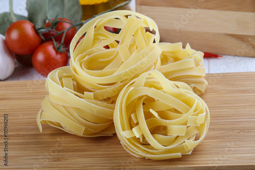 Raw fettuccine pasta