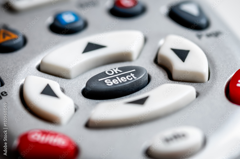 Silver TV Remote Control Buttons Close-Up Silver TV Remote Control Buttons Close-Up