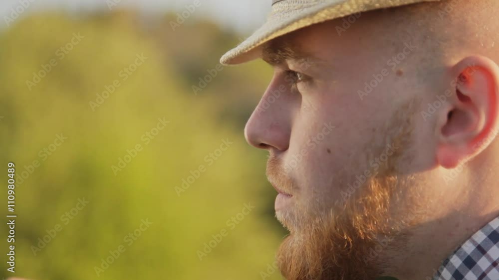 Portrait of a man, beer lover in nature on a sunny day. Portrait of a man, beer lover in nature on a sunny day.
