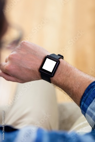 Man looking his smart watch