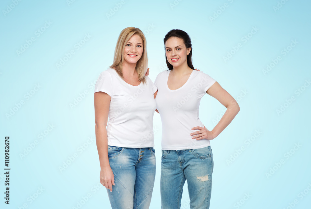group of happy different women in white t-shirts group of happy different women in white t-shirts