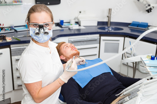Portrait of a dentist with a patient in dentistry