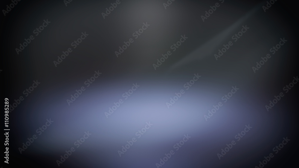 Blue blurred spotlight, dark abstract background