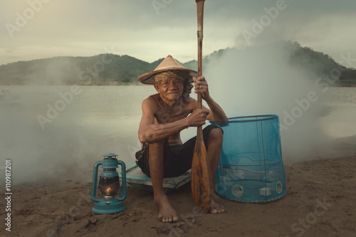 Portrait of an old fisherman of the Mekong River.