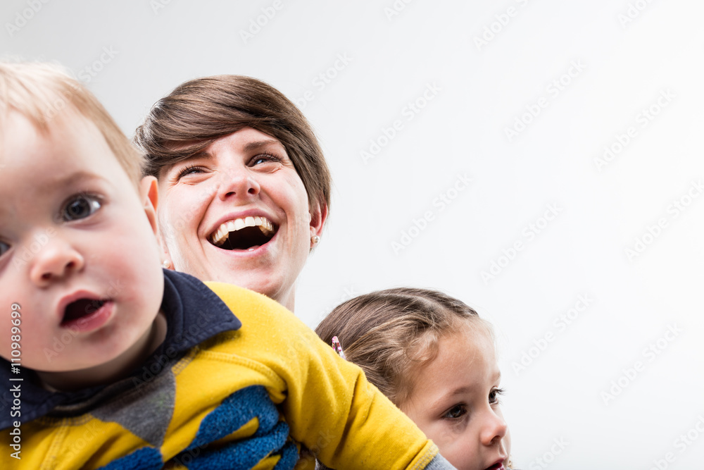 happy mother with daughter and son
