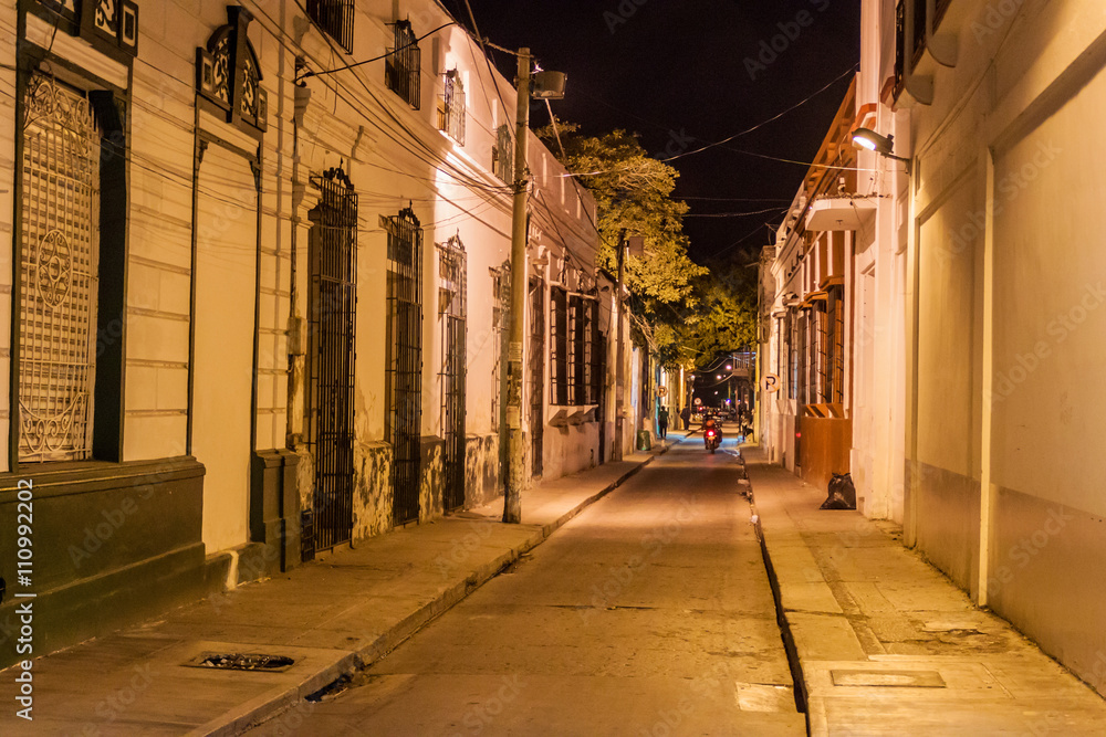 View of a night street in the center of Santa Marta, Colombia