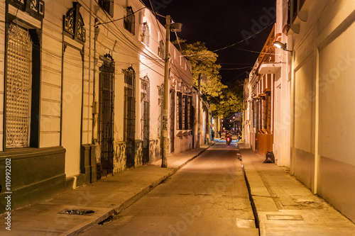View of a night street in the center of Santa Marta, Colombia