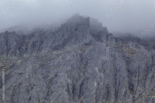 View of low cloud over rugged mountains, Ural mountains, Russia photo