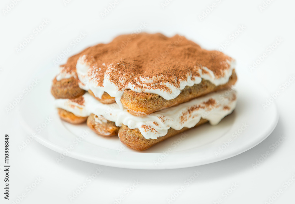 Tiramisu on white plate Tiramisu on white plate