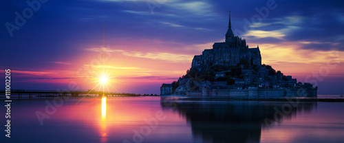 Panoramic view of Mont-Saint-Michel at sunset
