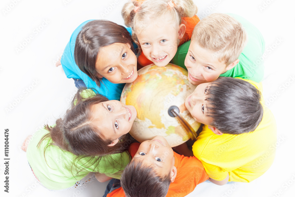 Group of international kids holding globe earth Group of international kids holding globe earth