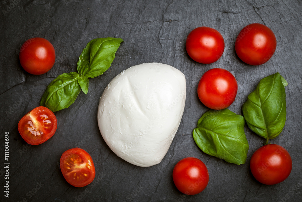 Mozzarella, tomato and basil. Mozzarella, tomato and basil.