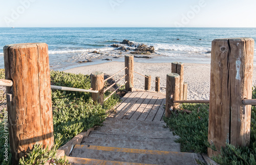 Carpinteria Coast Stairs. Stairs leading down to the beach and Pacific ocean at Carpinteria State Beach, California.  photo